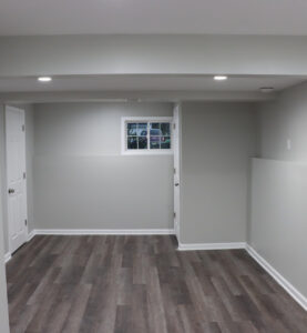 A modern design was instroduced for this basement remodel, and it's waiting to be furnished!