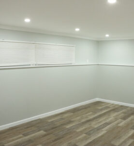 After our basement remodel this space was turned into a beautiful, livable, and modern room.