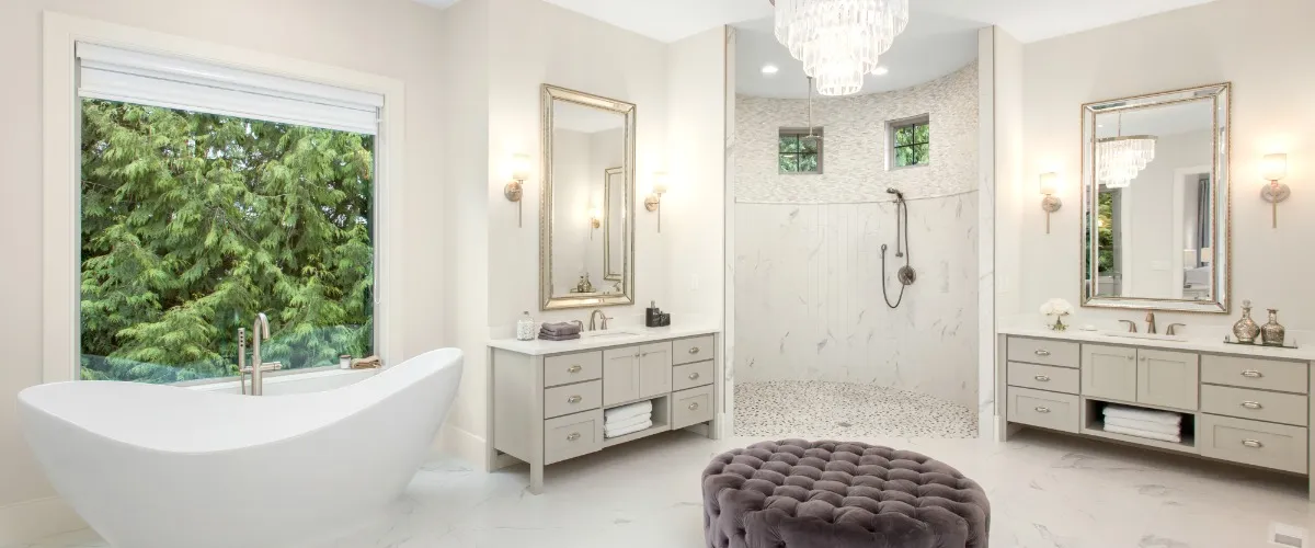 A spacious bathroom featuring a large tub and a walk in shower, designed for comfort and relaxation