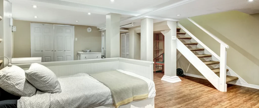 basement moisture matawan nj home remodeling modern basement bedroom with hardwood flooring white furniture and recessed lighting