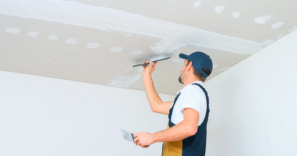 basement moisture matawan nj home remodeling professional contractor expertly applying joint compound to drywall ceiling