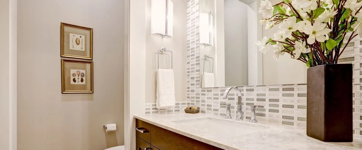 elegant powder room marble backsplash