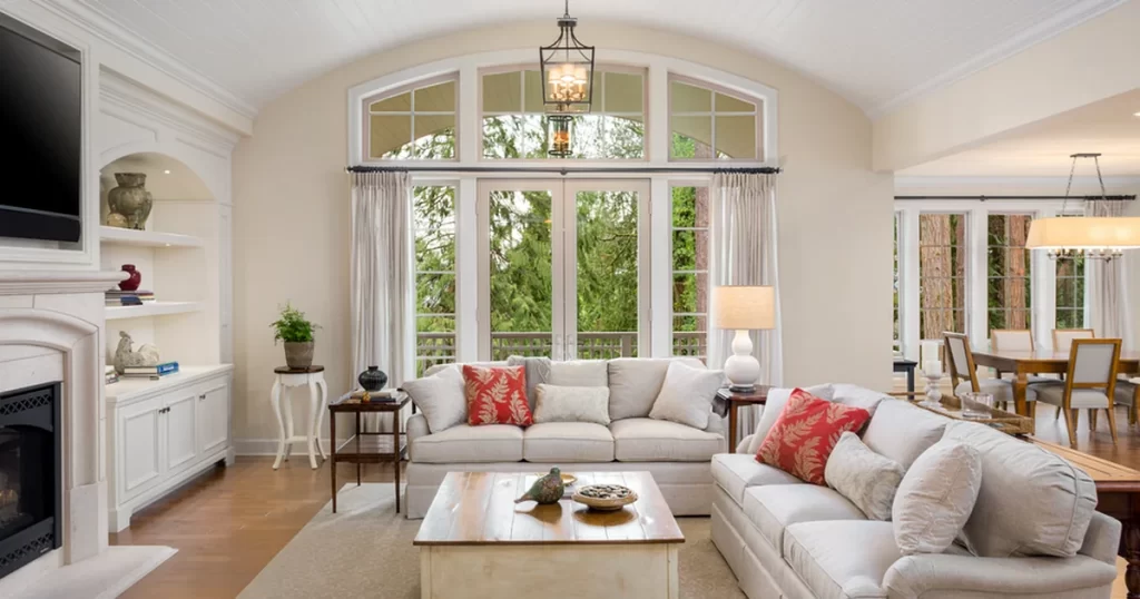 home remodeling colts neck nj bright elegant living room with vaulted ceiling large windows neutral furnishings